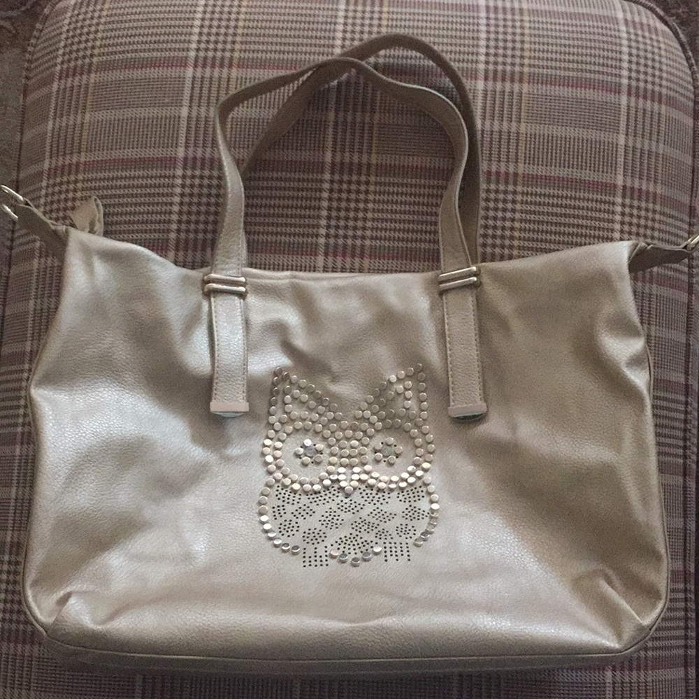 Check Out This Stud! Gold studded owl bag that is!